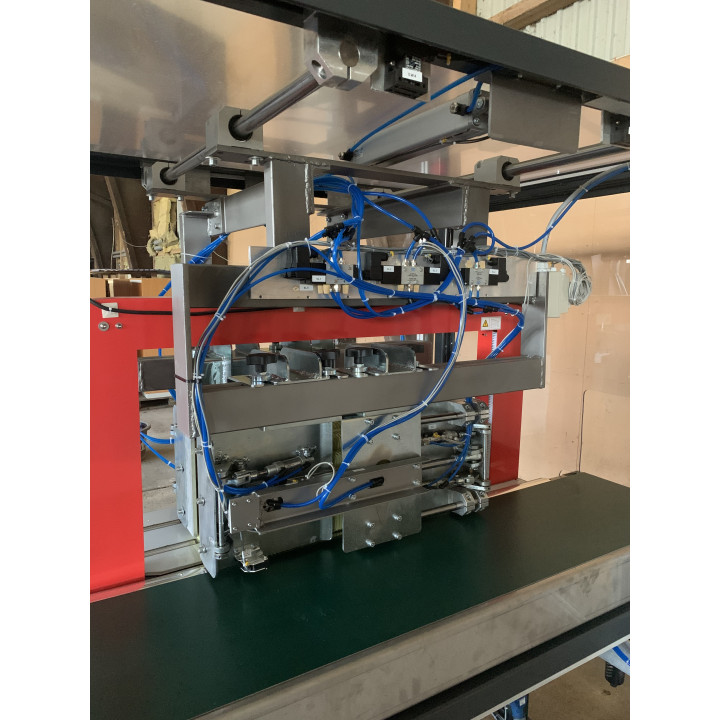 Inline compression and strapping unit fully automatic
